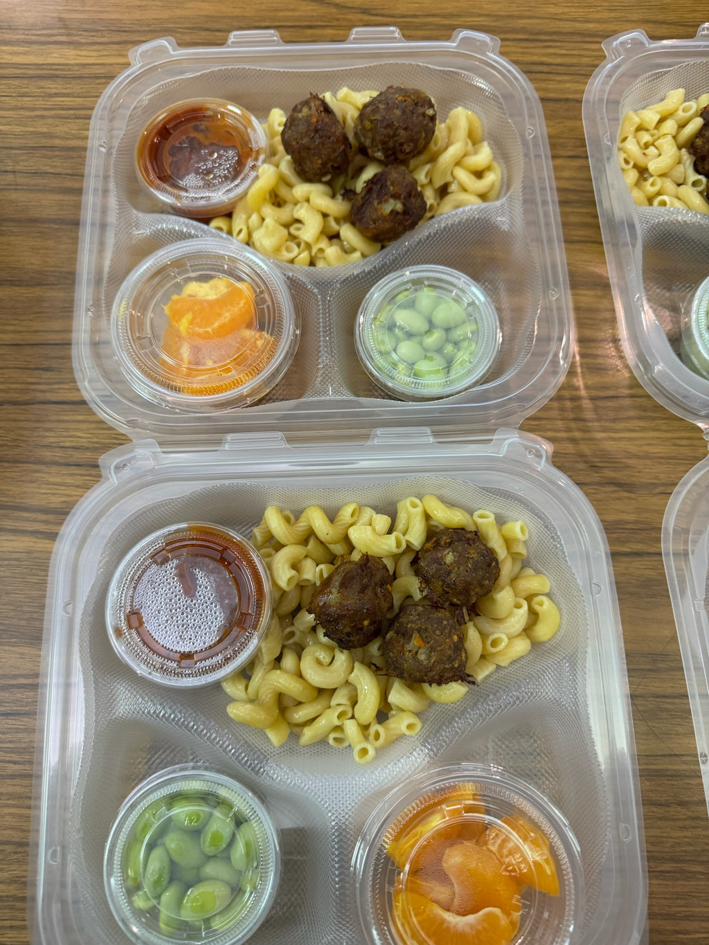 Mini beef meatballs (kosher, dairy, gluten-free). Protein pasta and fresh marinara - (NO added sugar or preservatives) with hidden carrots. Fresh fruit and shelled edamame)